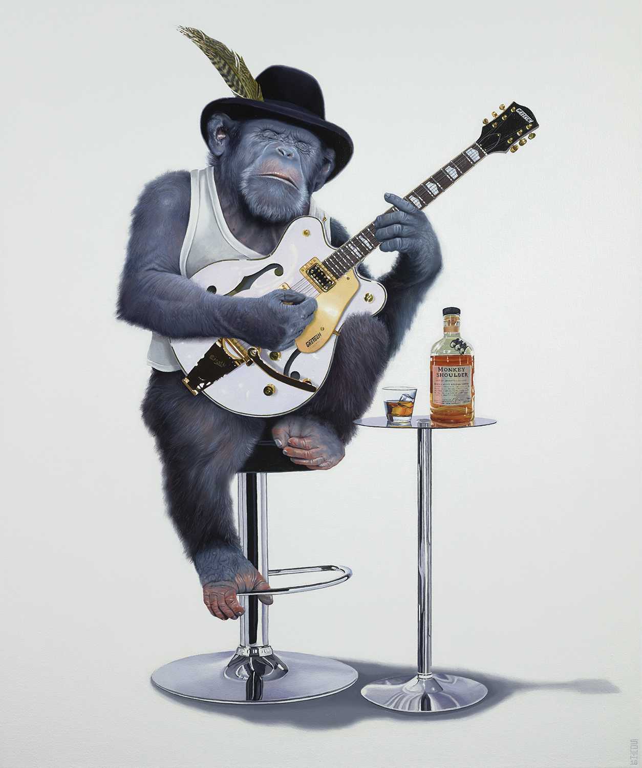 A monkey playing the guitar with a bottle of Monkey Shoulder next to him - Tony South - Too Much Monkey Business